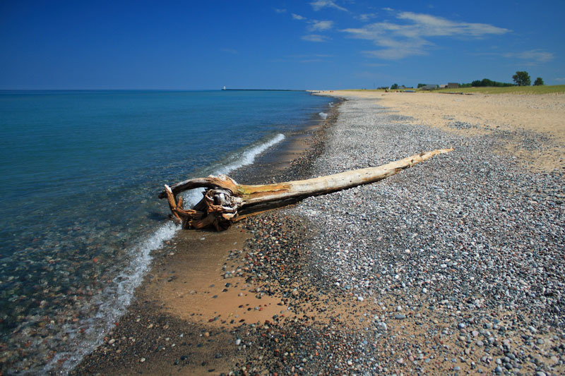 the woodland park beach looking towards the grand marais harbor